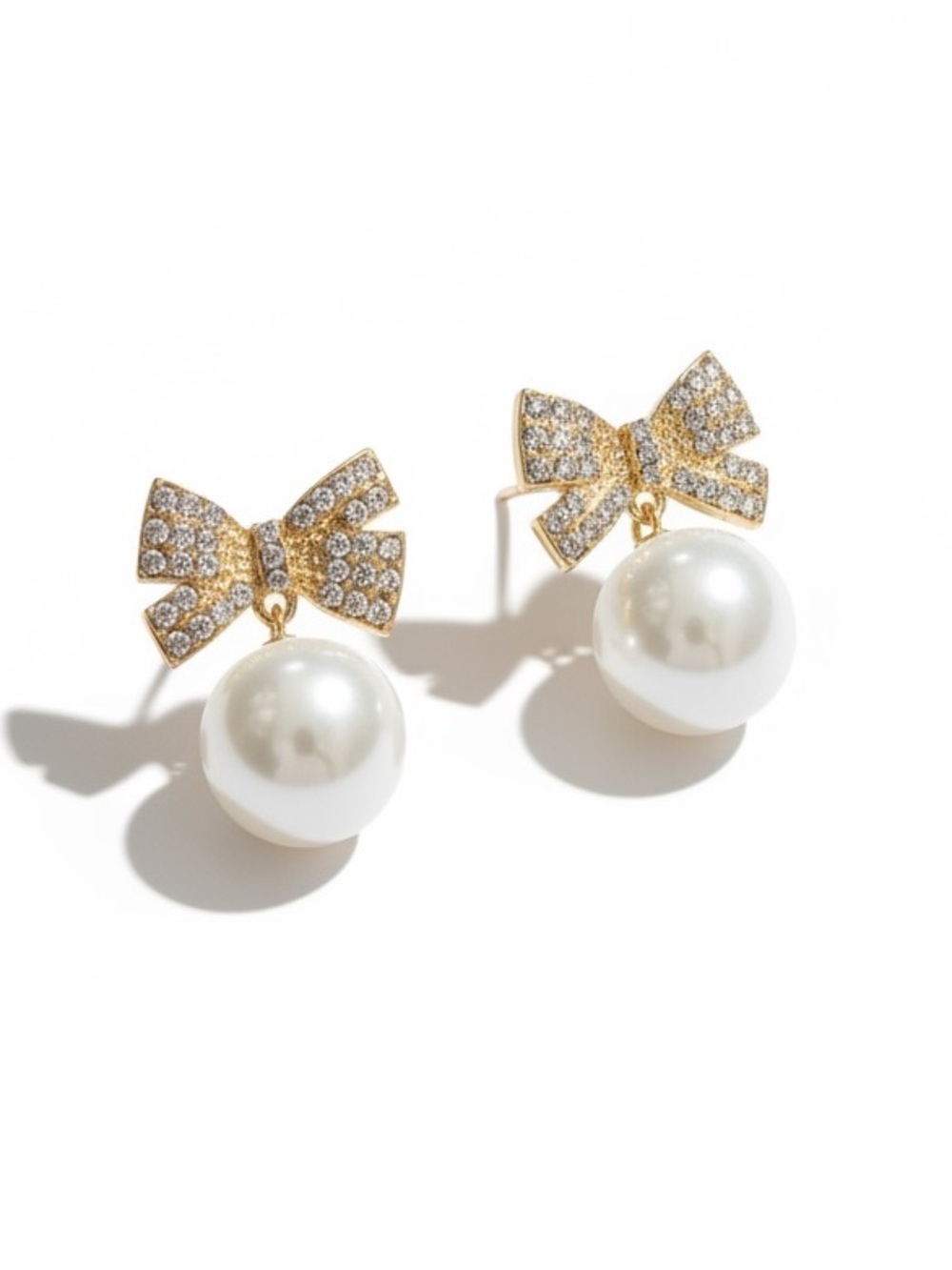 Allover Rhinestone Bow Pave Look Dangling White Pearl Coquette Gold Earrings